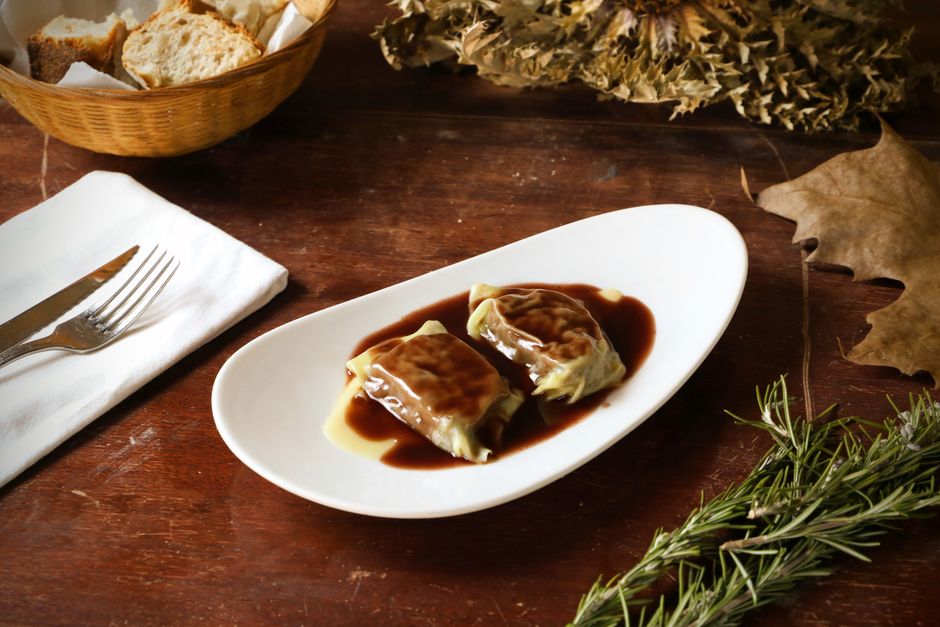 Stuffed cabbage rolls yogurt with side rice